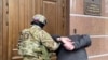 Российский суд дал 6 и 20 лет обвиняемым в подготовке диверсий в аннексированном Крыму